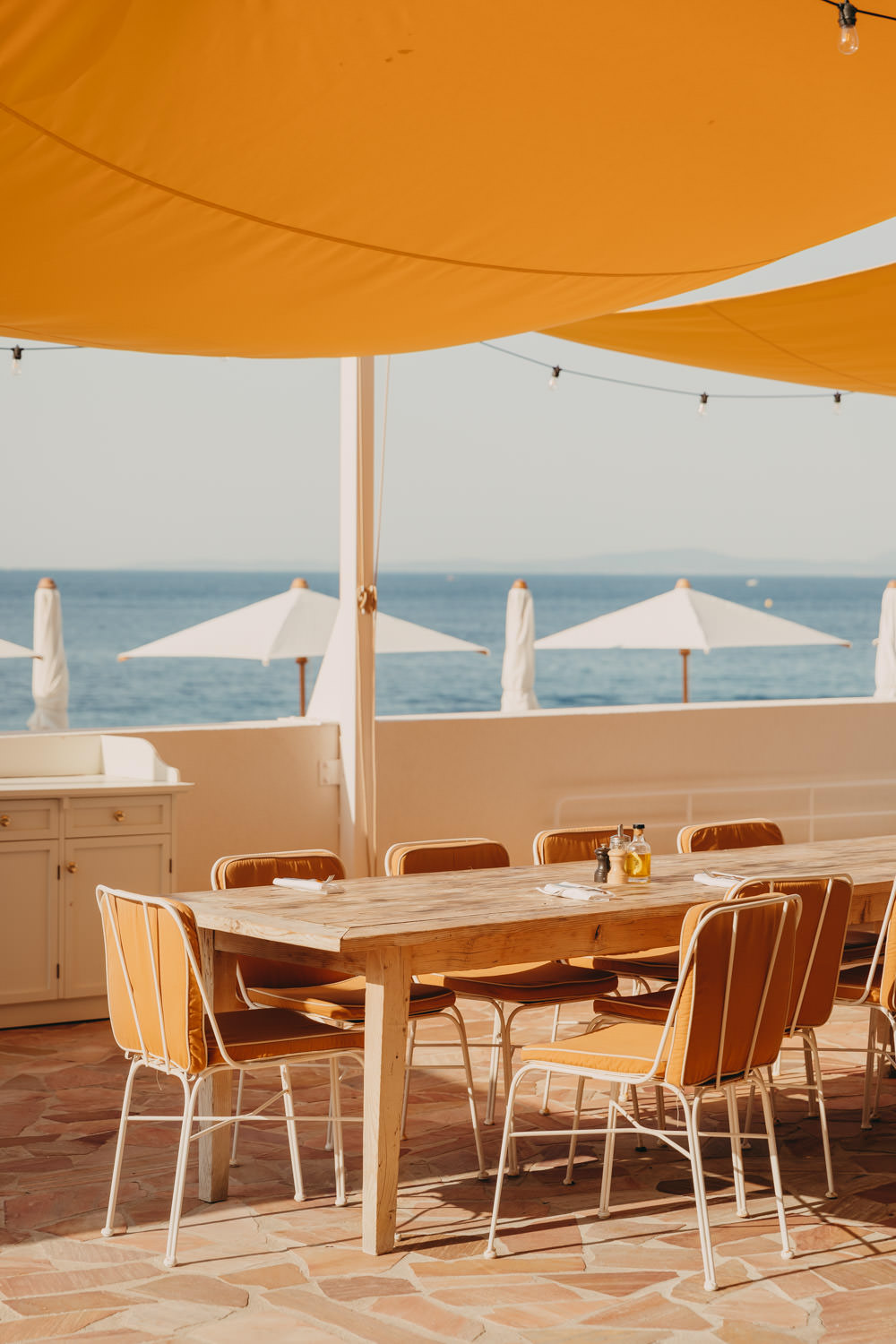 table and chairs at les roches rouges
