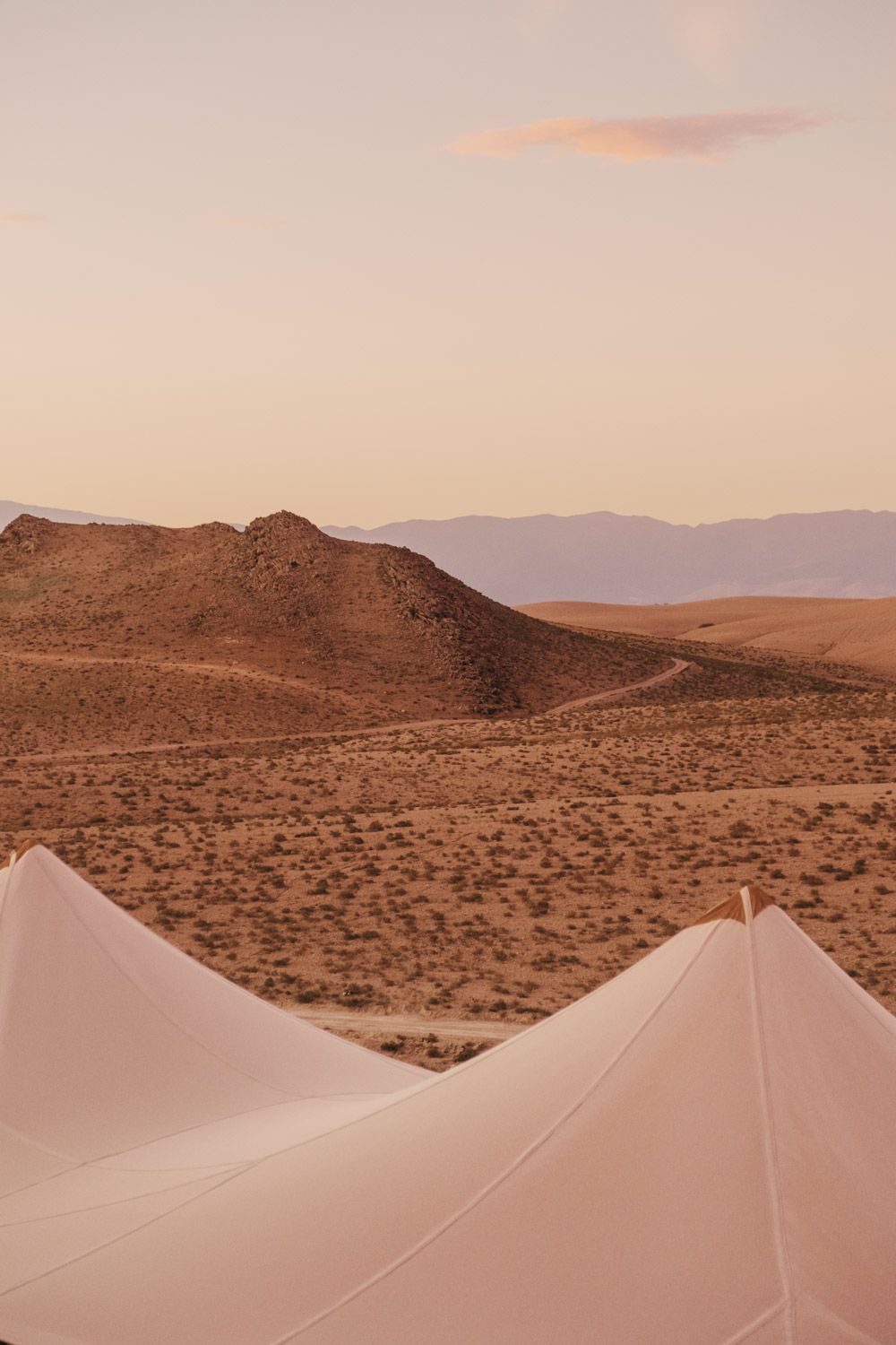sunrise view of the camp and desert at scarabeo camp